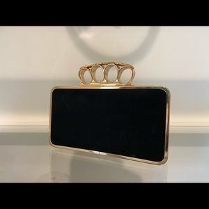 BCBGMAXAZRIA Four Ring Clutch Purse
